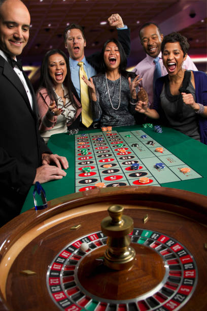 Play'n GO roulette table in action showing live dealer spinning wheel and players betting in real-time